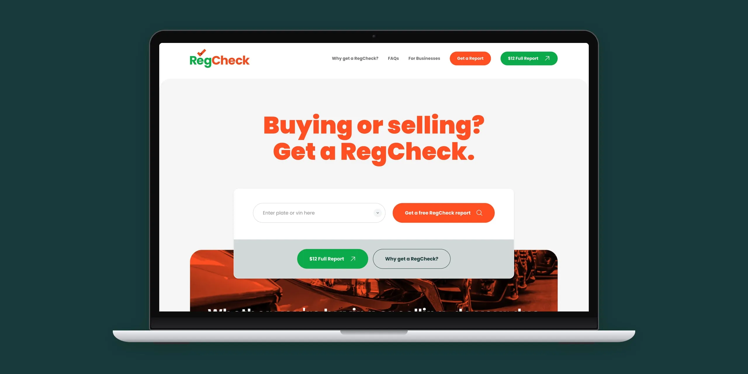 The RegCheck homepage on a laptop