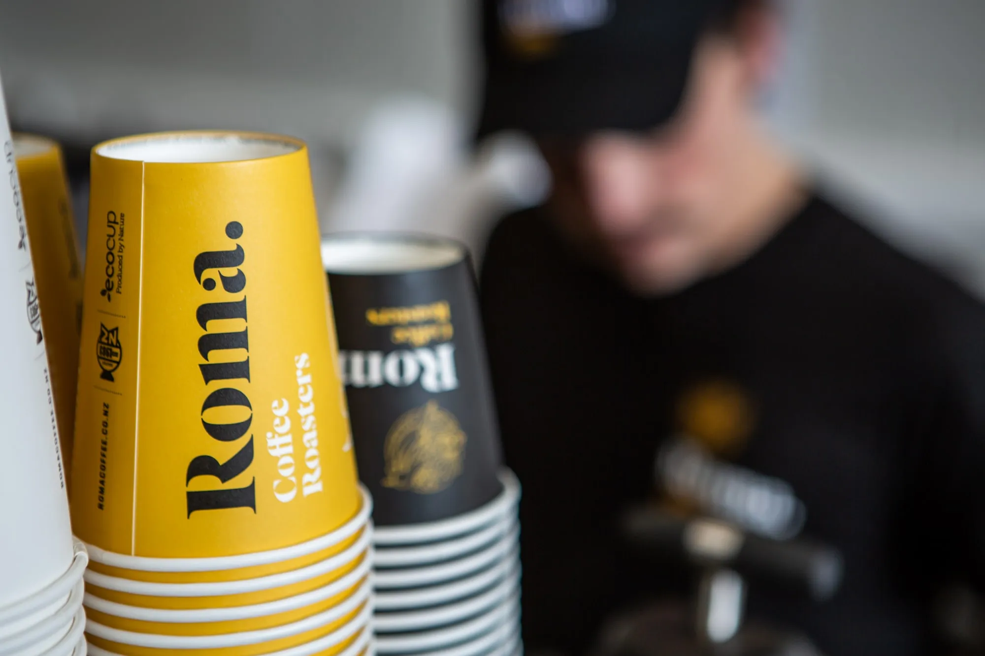 Roma coffee cup on machine