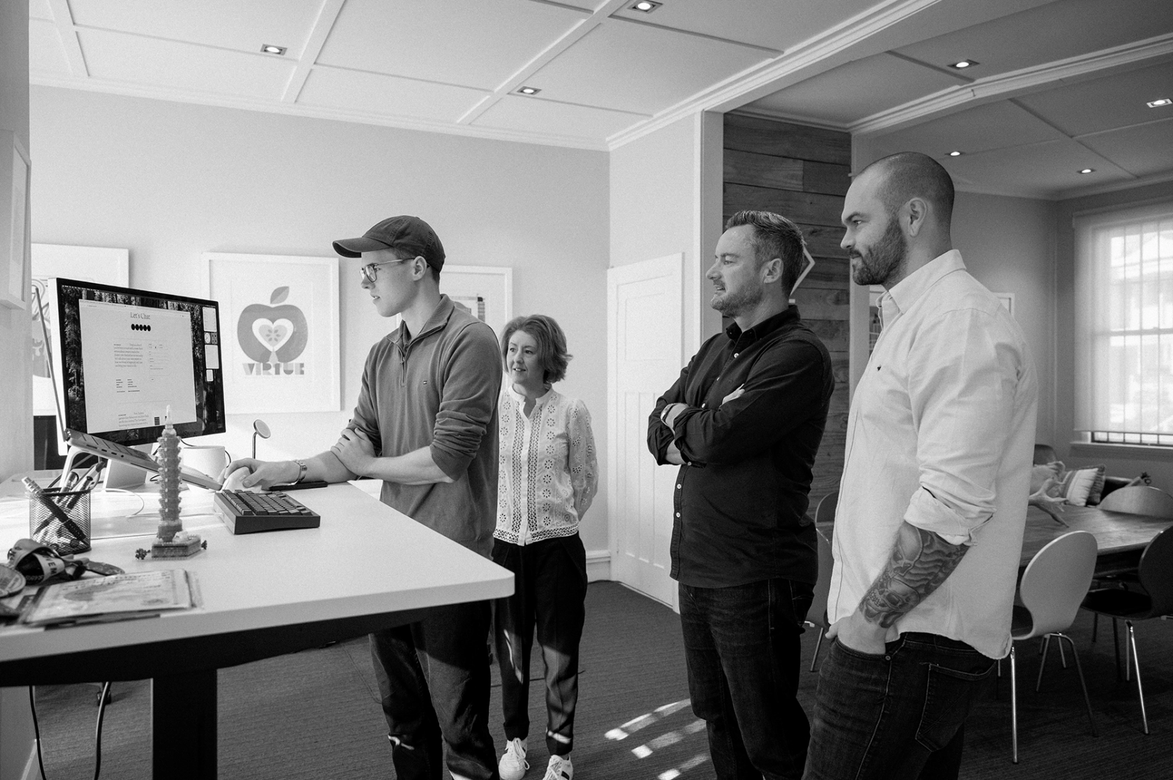 Caretakers team watching a developer at work